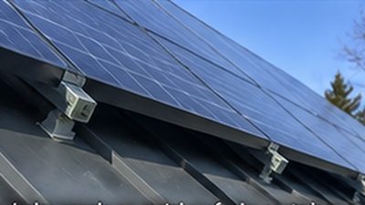 Solar panels mounted with seam clamps on a standing seam metal roof